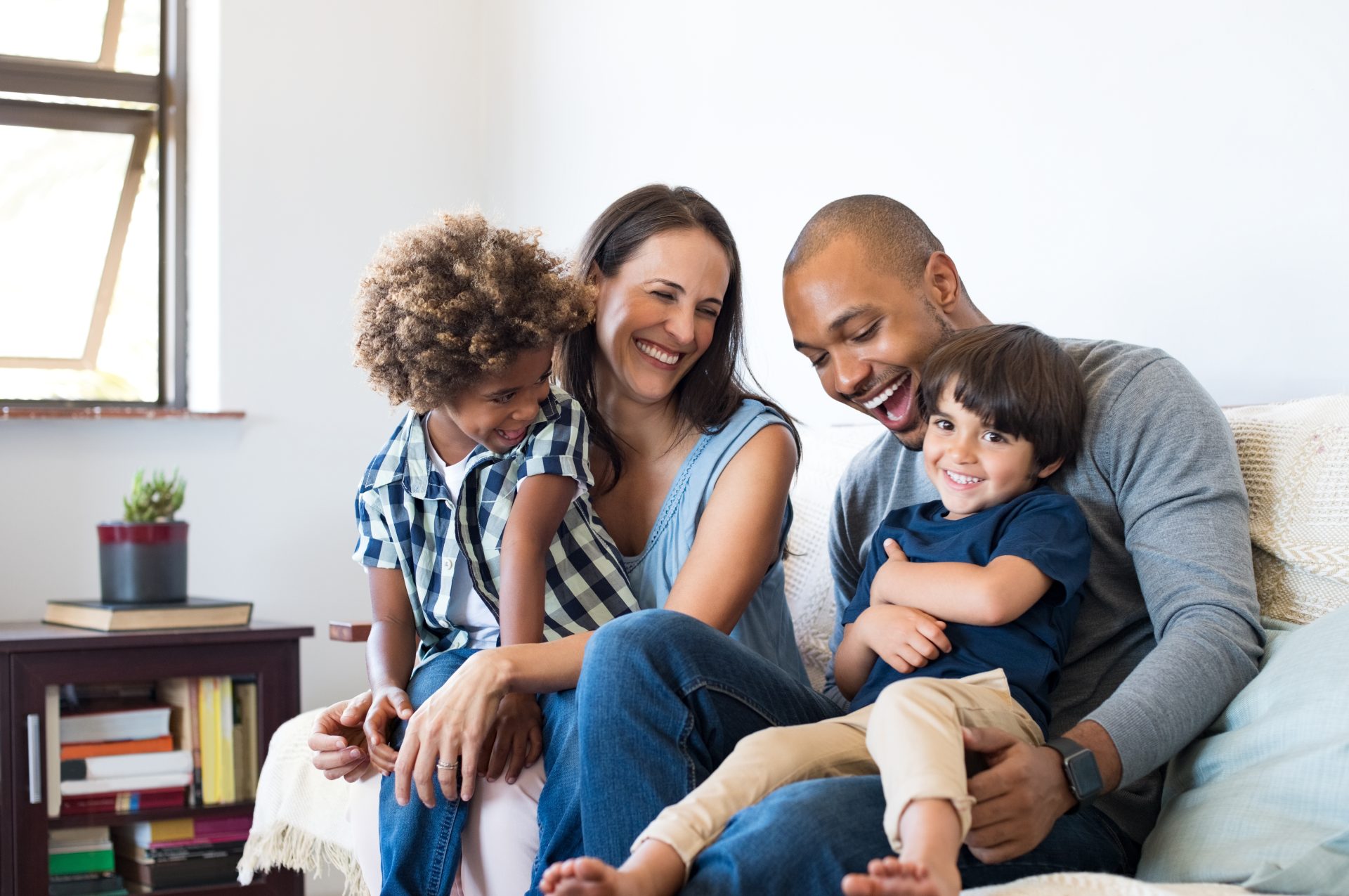 family holding each other happily